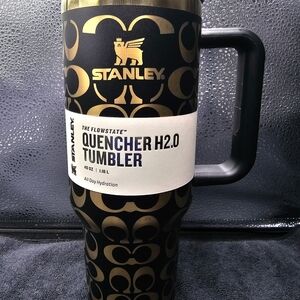 Stanley Black and Gold Travel Mug